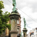 Statues of a plumber and tiler, two of 48 professions depicted
